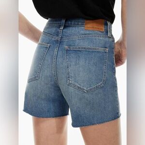 Aritzia DENIM FORUM medium wash denim shorts w rustic/distressed vibe